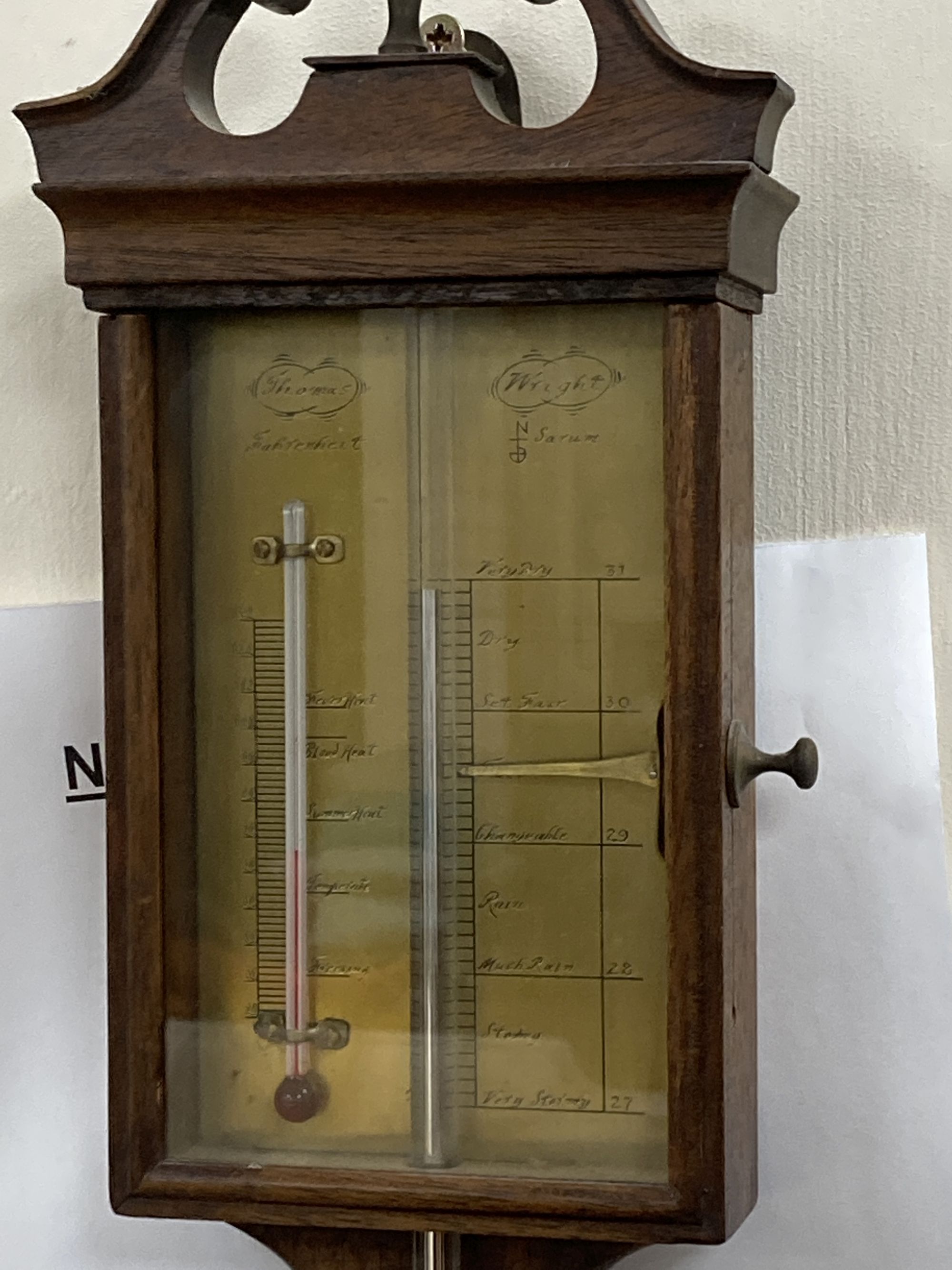 A George III style mahogany stick barometer, signed Thomas Wright, height 97cm